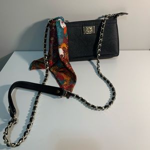Love Moschino purse with chain and scarf accessory.
